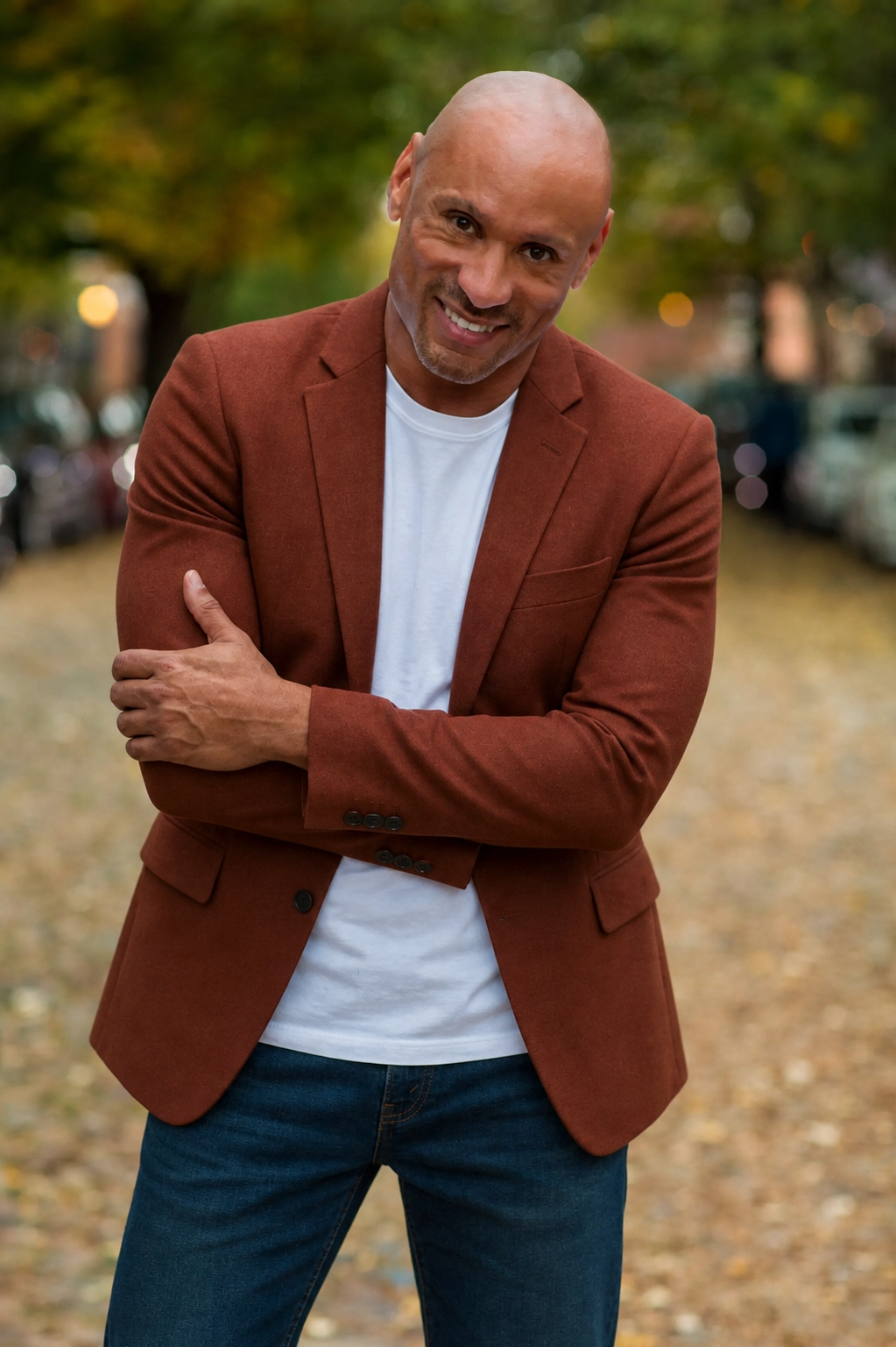Bernard Owens — author portrait in rust blazer