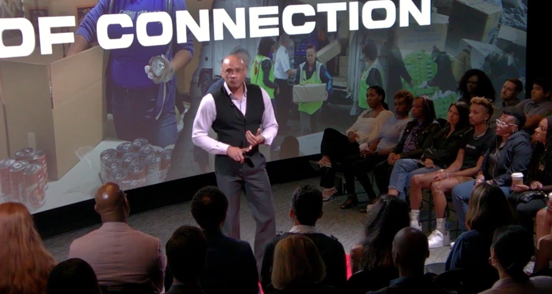 Bernard Owens speaking to a live audience — 'Of Connection' presentation