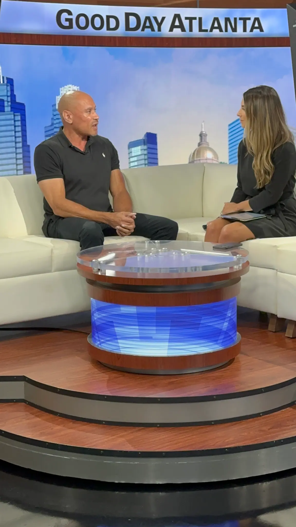 Bernard Owens at the Good Day Atlanta podium